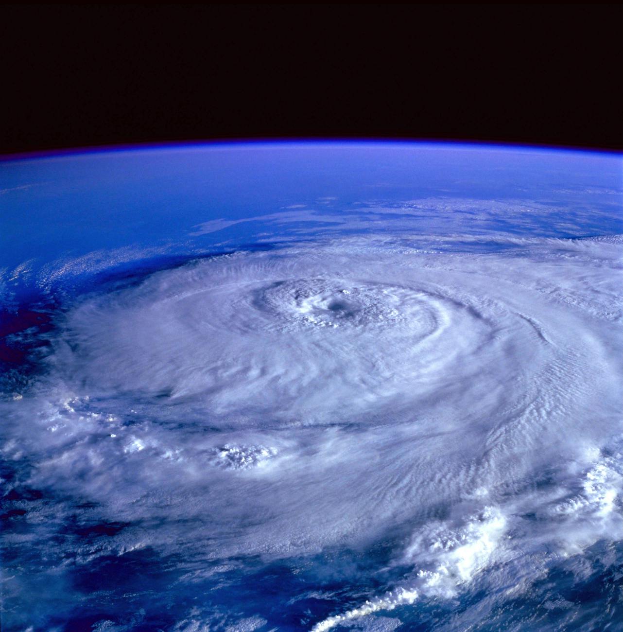 Image of a hurricane or a storm with a violent wind. In particular a tropical cyclone is a system of winds rotating inward to an area of low atmospheric pressure, with a counterclockwise (northern hemisphere) or clockwise (southern hemisphere) circulation; a depression.